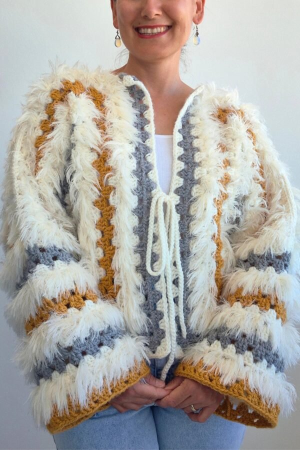 Free fringe crochet cardigan pattern with boho textured stripes and shaggy details