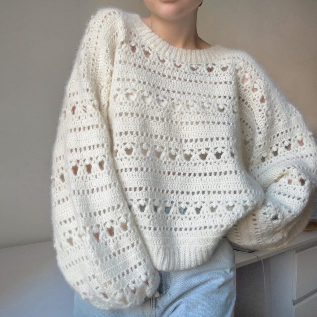 Beautiful lacy sweater crochet pattern with delicate oversized pullover design